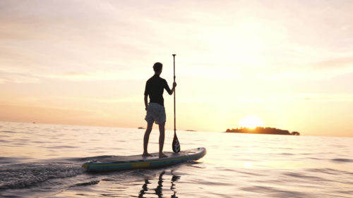 ©SCUBAJET Pro SUP Kit on the water while the sun goes down