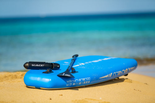 ©SCUBAJET mounted on a SUP with a paddle on the beach